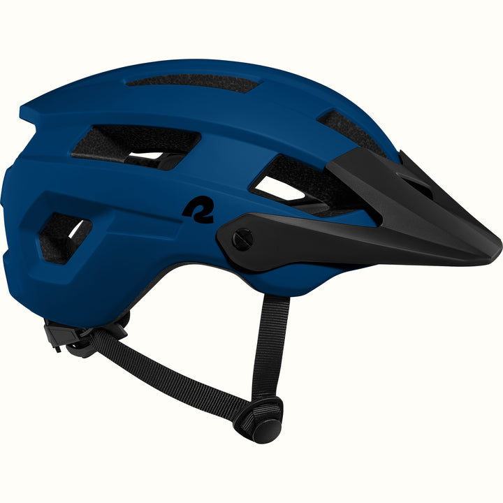 A sleek, modern Rowan Youth mountain bike helmet in blue with ventilation slots and a black visor, designed for safety and style.
