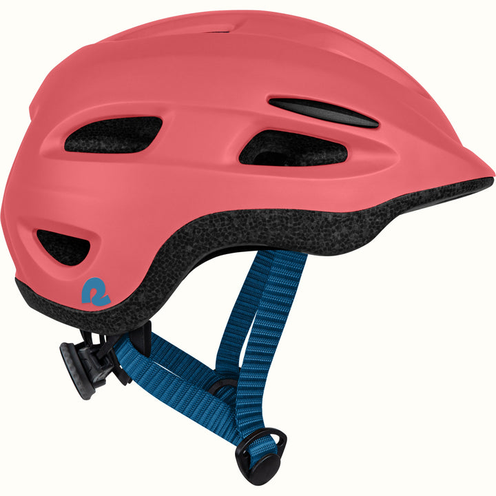 Coral helmet with blue strap on a white background.