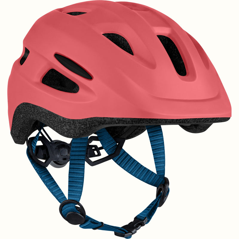 Coral helmet with blue strap on a white background.
