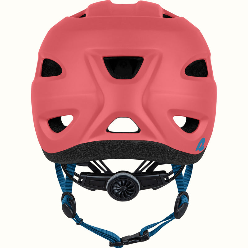 Coral helmet with blue strap on a white background.