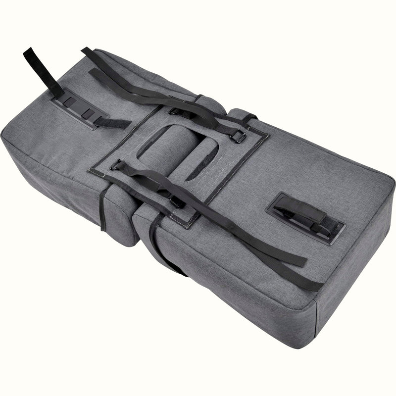 A view of the backside of the saddle pannier bags featuring their velcro straps used to fasten to the rear bike rack.