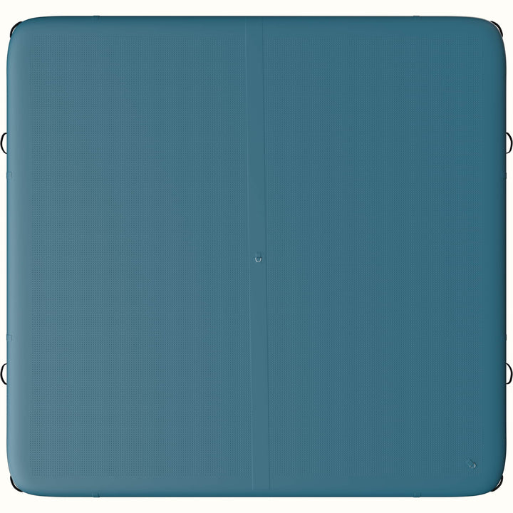 Bottom view of the Siesta Inflatable Dock with two D-rings in atlantic blue color.