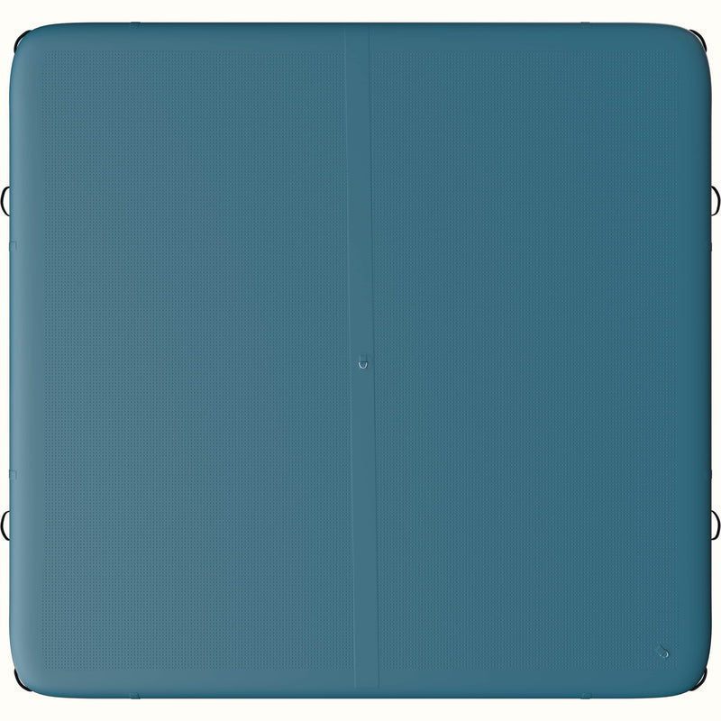 Bottom view of the Siesta Inflatable Dock with two D-rings in atlantic blue color.