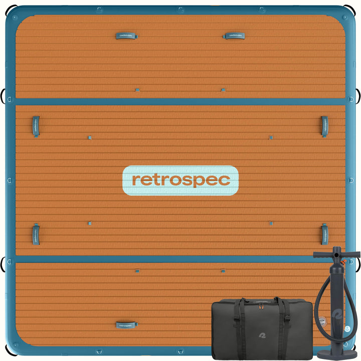 Siesta Inflatable Dock XL in atlantic blue shown with the included accessories like a pump and bag on the side.