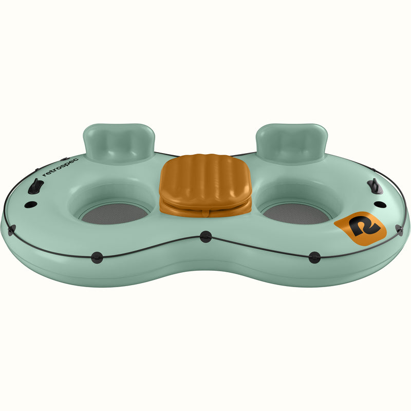 A light green inflatable tube with two seating areas and a center cooler, designed for recreational water use.