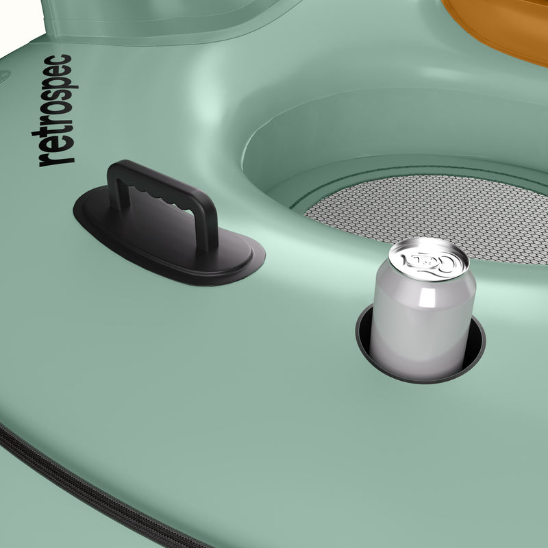 Close-up of a light green inflatable tube with a heavy duty handle and cup holder, featuring the retrospec brand.