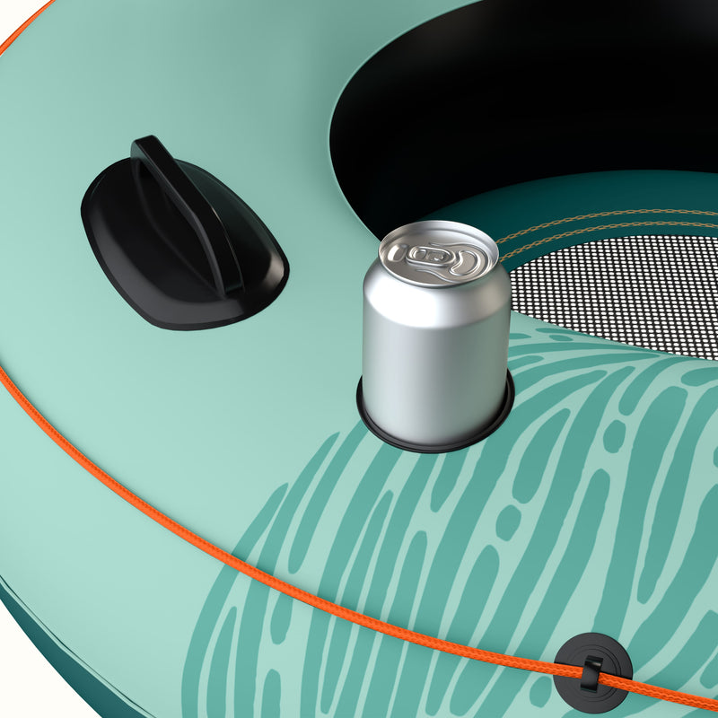 Close up of a seafoam tide inflatable tube's handle and a silver can in the cup holder.