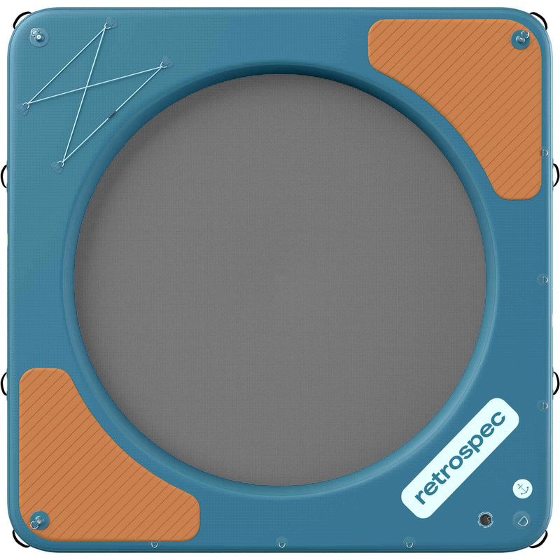 Top view of the Siesta Hammock XL Inflatable Water Platform 10' showing a blue deck with wood panel texture accents and bungee storage area, with a circle mesh center.