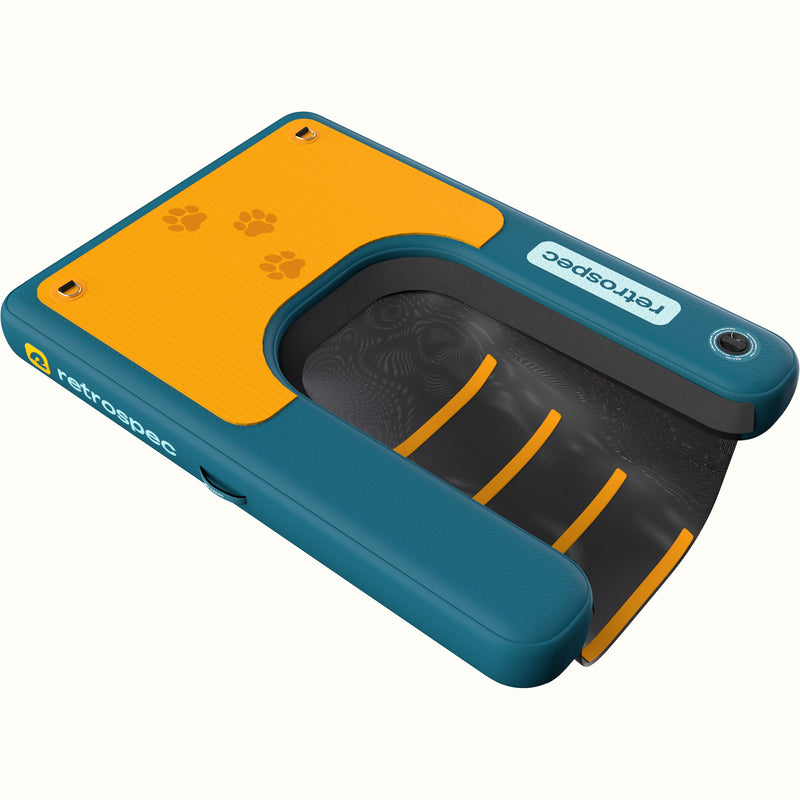 Top view of the Siesta Pup Inflatable Pet Ramp in teal and orange with non-slip surface and high visibility ramp, featuring a paw print design, "retrospec" logo, and a handle on the rail.