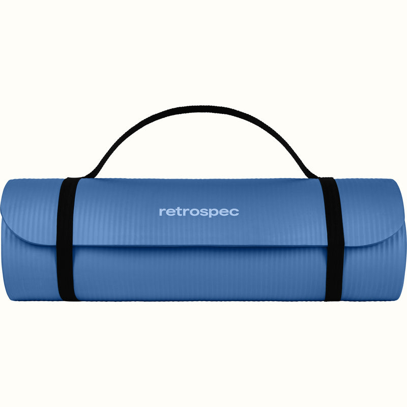 Blue Solana 1" Yoga Mat rolled up and secured with black straps on a white background, featuring the retrospec brand.