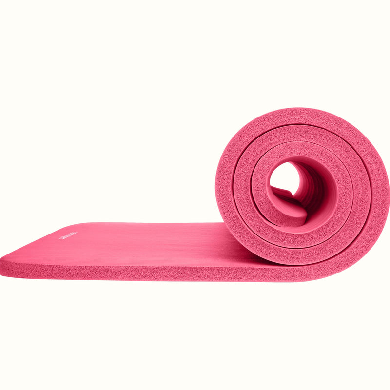Pink Solana 1" Yoga Mat with a white retrospec logo on a white background.