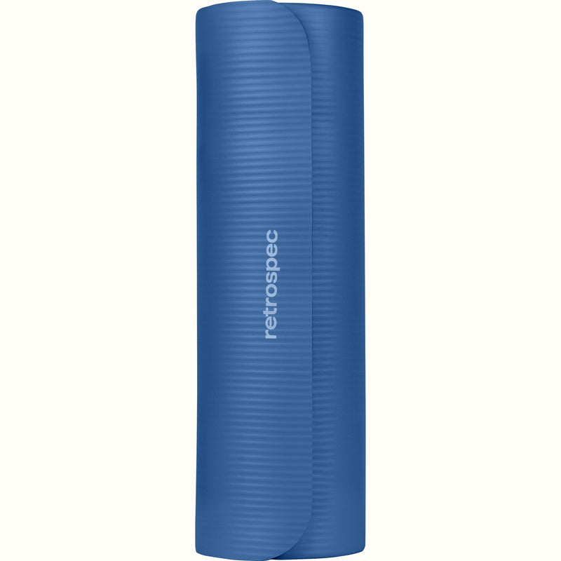 Rolled up blue Solana .5" Yoga Mat with 'retrospec' branding on a white background.
