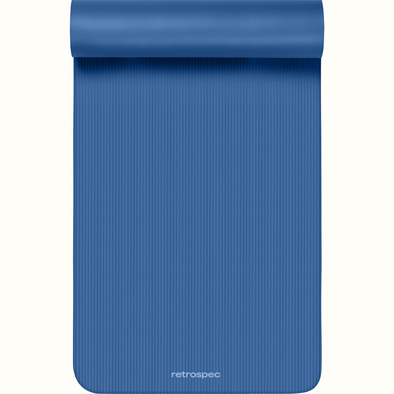 Blue Solana .5" Yoga Mat with 'retrospec' branding on a white background.