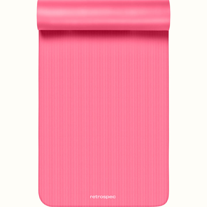 Pink Solana .5" Yoga Mat with 'retrospec' branding on a white background.