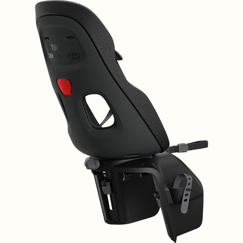 Rear view of the Black Thule Yepp Nexxt 2 Maxi Child Bike Seat showcasing the reflector on a white background.