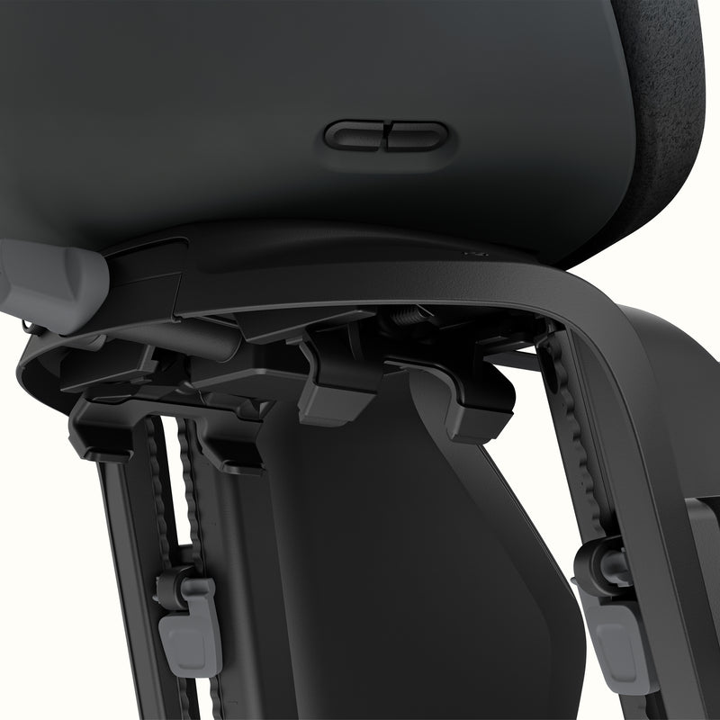 Close-up of Black Thule Yepp Nexxt 2 Maxi Child Bike Seat on a white background.