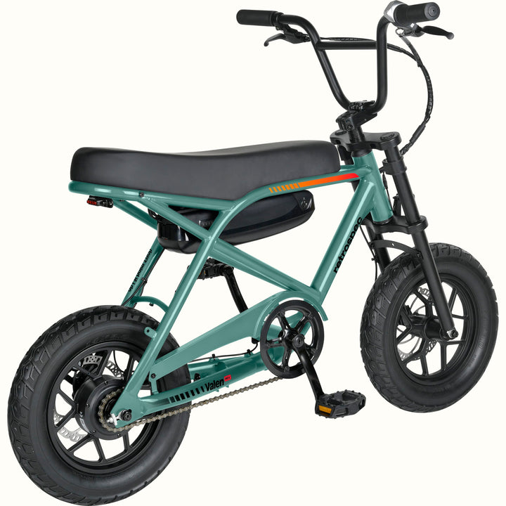A small electric bike with a green frame, black seat, black tires, and a black battery pack mounted on the frame, shown against a plain white background.