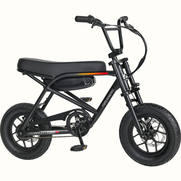 A mini electric bicycle with a black frame, black seat and tires, and a black battery pack mounted on the rear frame, shown against a plain white background.