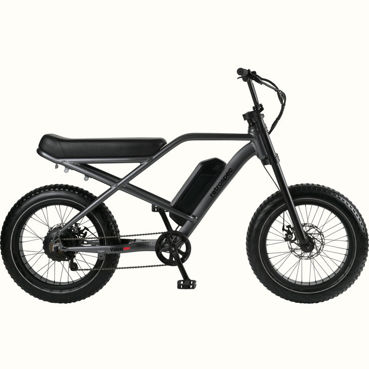Matte Graphite Valen Rev 3 Fat Tire Electric Bike with black seat on a white background.