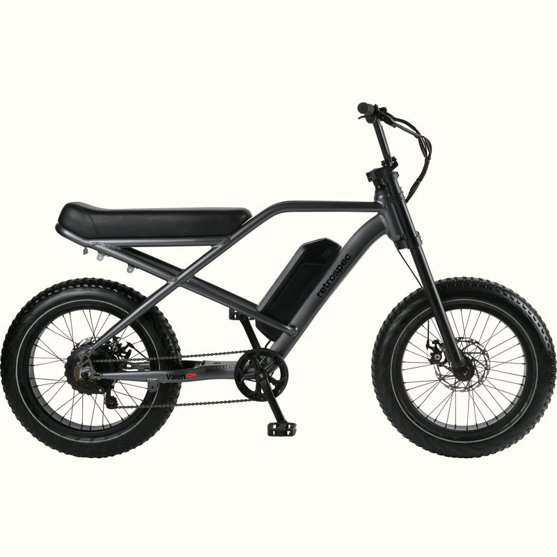 Matte Graphite Valen Rev 3 Fat Tire Electric Bike with black seat on a white background.