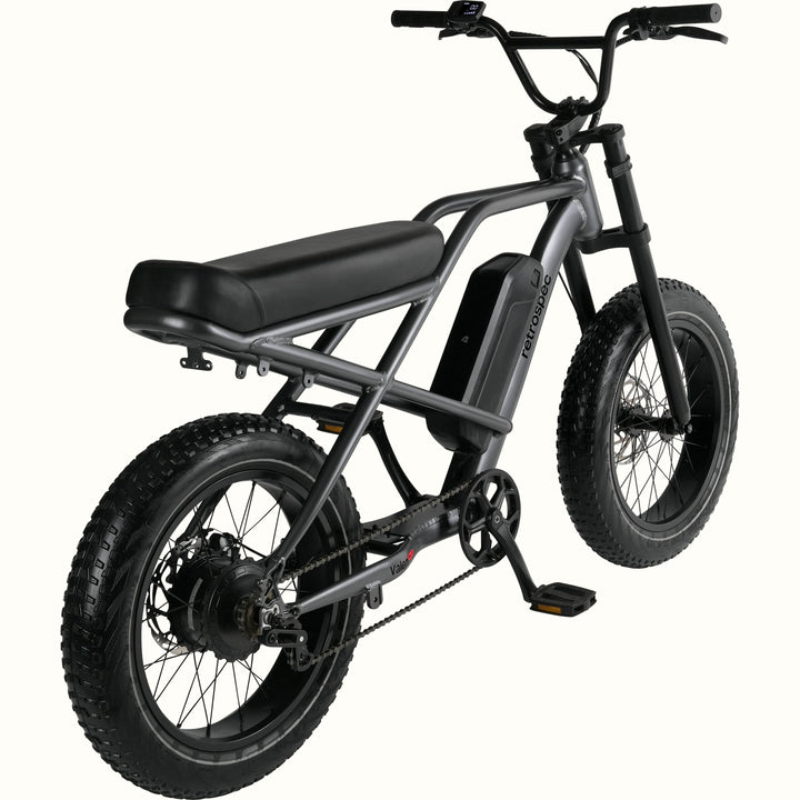 Matte Graphite Valen Rev 3 Fat Tire Electric Bike with black seat on a white background.