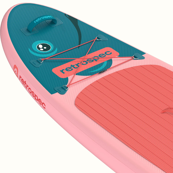 Close-up of the Weekender Nano Kids Inflatable Paddle Board's nose with retrospec logo and fish design with four point bungee for storage.