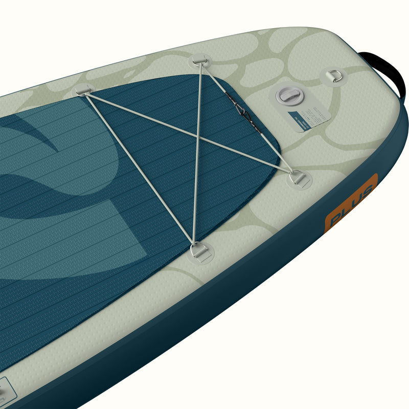 Close-up of the tail of the retrospec Weekender Plus Inflatable Stand Up Paddle Board Kayak Hybrid 10'6" in River Ripple Blue, showing the bungee cargo lacing, D-rings, inflation valve, carry handle, and the orange "PLUS" badge on the teal rail.