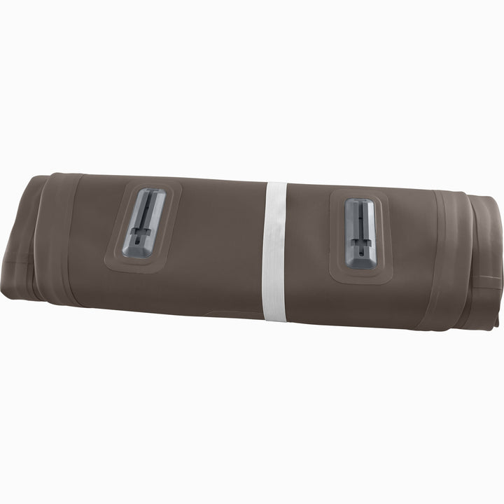 The Weekender XL Inflatable Paddle Board deflated and rolled up, secured with a grey band.