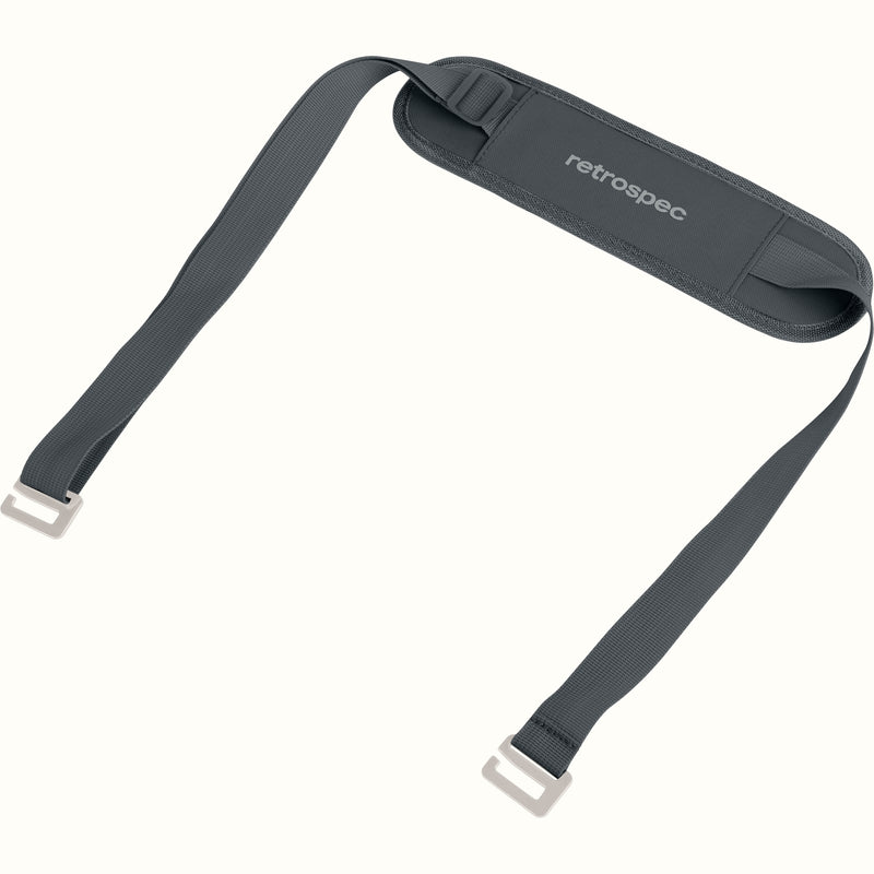 A padded dark gray shoulder strap designed for carrying paddle boards, with the brand 'retrospec' visible on the strap's padding.