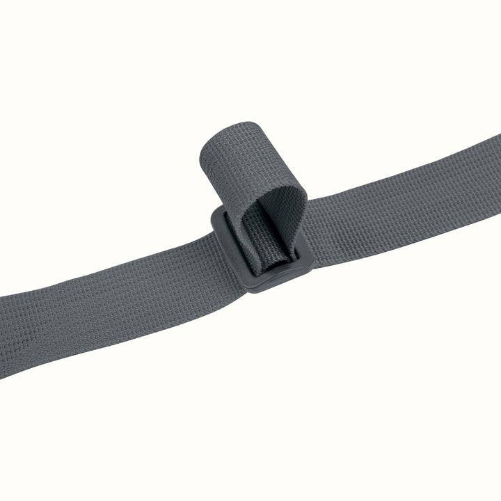A dark gray strap with a buckle to adjust length on a white background.