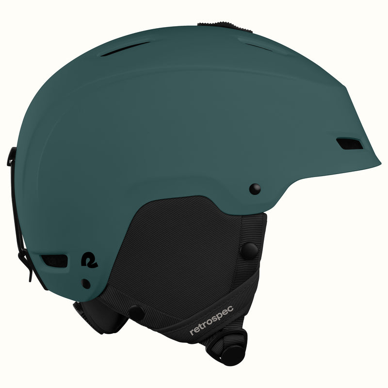 Side view of the retrospec Zephyr ski helmet in Matte Deep Glacier with a retrospec-branded strap.