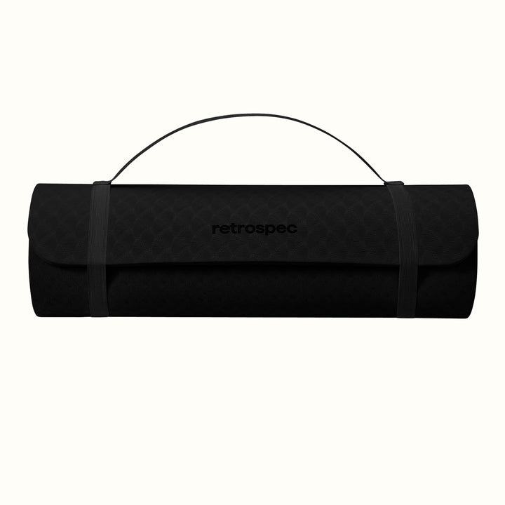 Black rolled-up yoga mat with carrying strap and "retrospec" logo on a white background.