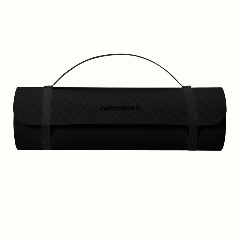 Black rolled-up yoga mat with carrying strap and "retrospec" logo on a white background.
