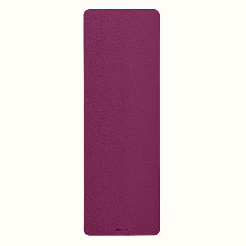 Boysenberry Zuma Yoga Mat with textured surface on a white background.