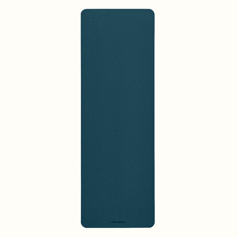 Ocean Blue Zuma Yoga Mat with textured surface on a white background.
