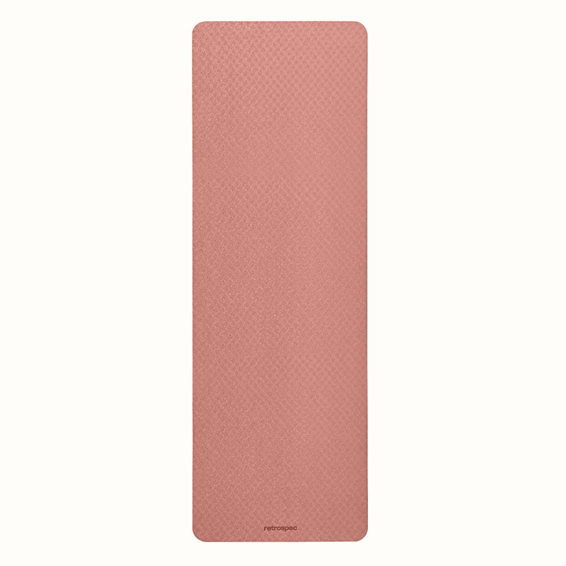 Rose Zuma Yoga Mat with textured surface on a white background.
