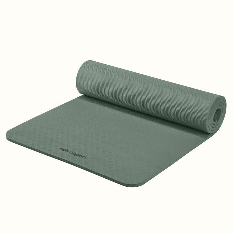 Partially rolled out Sage Zuma Yoga Mat with textured surface on a white background.