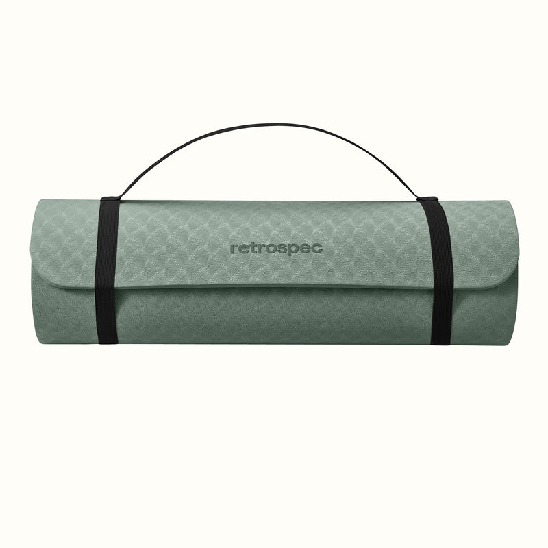 Sage rolled-up yoga mat with carrying strap and "retrospec" logo on a white background.