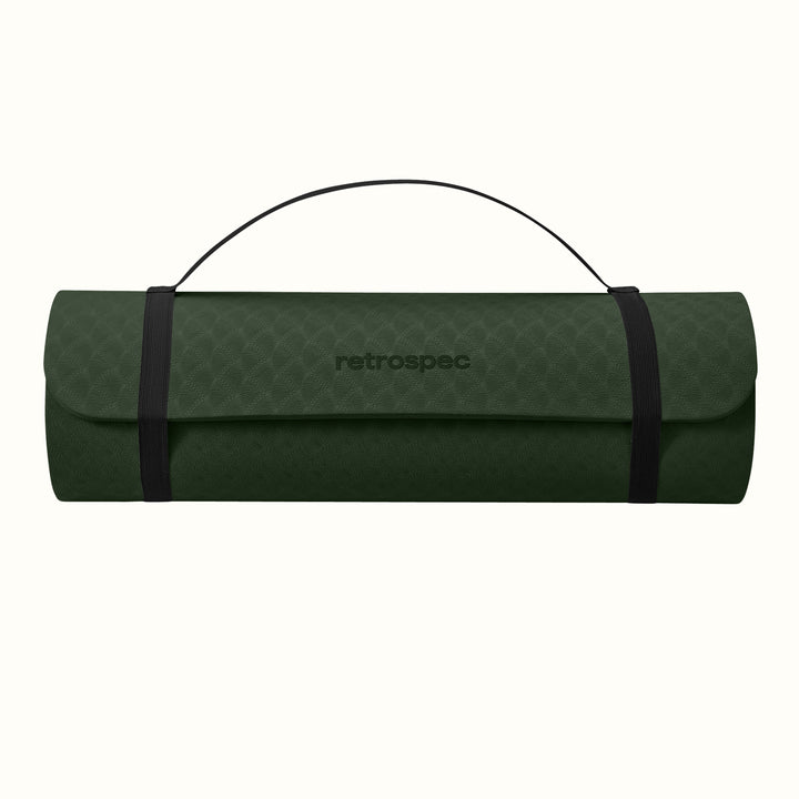 Wild Spruce rolled-up yoga mat with carrying strap and "retrospec" logo on a white background.