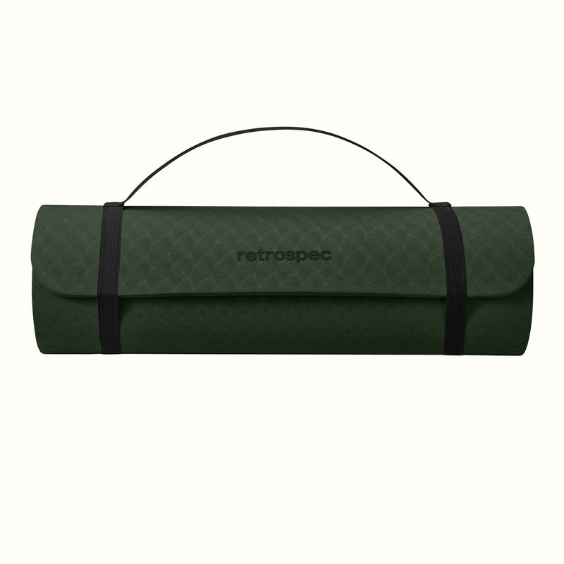Wild Spruce rolled-up yoga mat with carrying strap and "retrospec" logo on a white background.