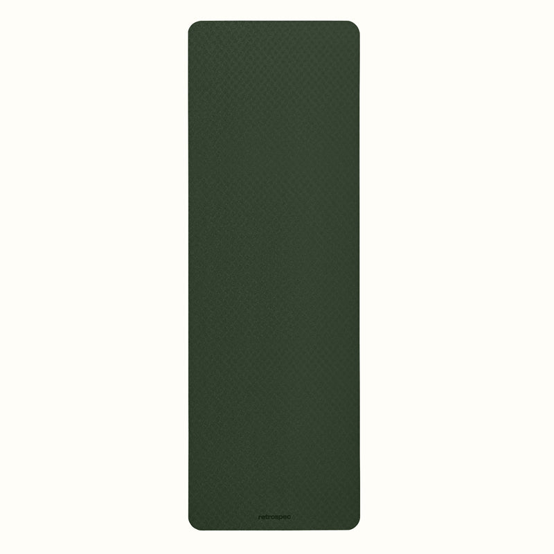 Wild Spruce Zuma Yoga Mat with textured surface on a white background.